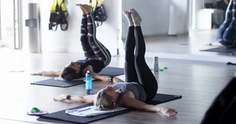 Athletes exercising together in a gym class Stock Footage 100187136