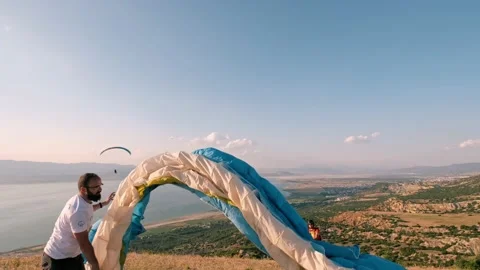 Athletes Flying with Paragliding Stock-Footage 201609189