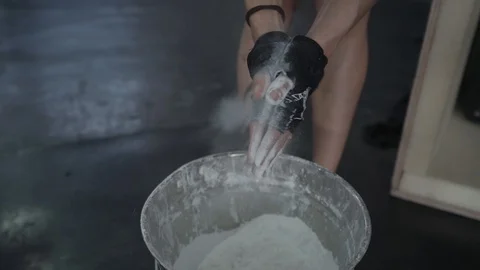 Athlete's hands magnesia close-up Stock Footage 104409570