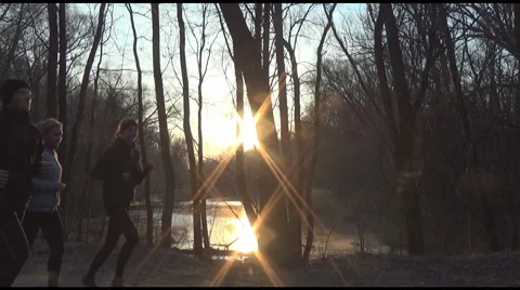 Athletes, jogging, lake 스톡 동영상 48500958