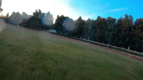 Athletes jogging, training at the stadium Vídeo Stock 169406041