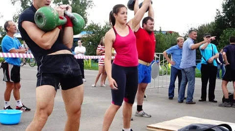 Athletes lift weights Stock Footage 53206517