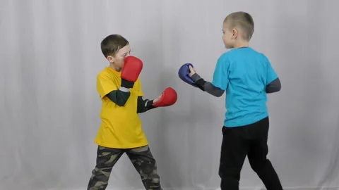 Athletes make a punch in a jump Stock Footage 150556636