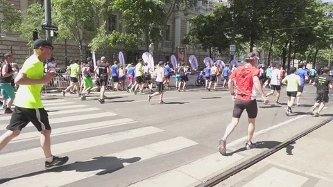 Athletes marathon run camera back slow motion Stock Footage 89829496