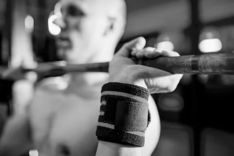 Athletes preparing for barbell exercises Stock Photos