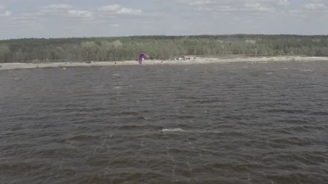 Athletes ride kite surfin. Kiev sea. Summer. Windy weather. Stock Footage 197688982