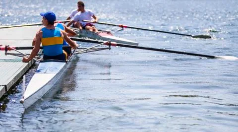 Athletes on a rowing competition Stock Photos