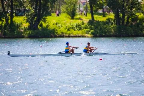 Athletes on a rowing competition Stock Photos