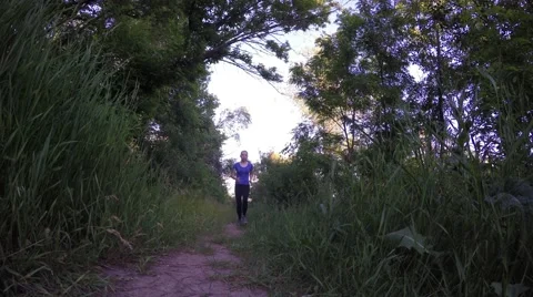Athletes running competition on the rough terrain. 動画素材 50650581