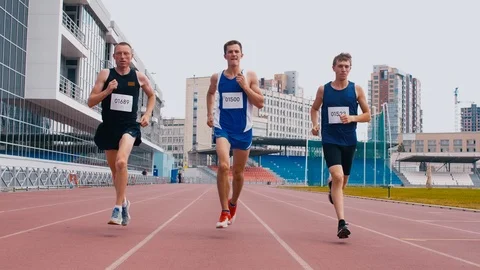 Athletes running on track Stock-Footage 113465426