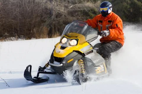 Athletes on a snowmobile. Stock Photos