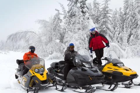 Athletes on a snowmobile Stock Photos