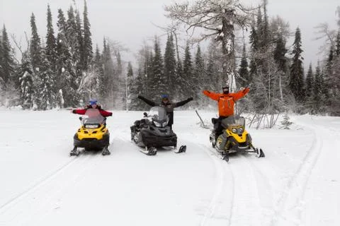 Athletes on a snowmobile Stock Photos