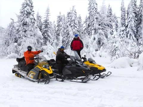 Athletes on a snowmobile Stock Photos