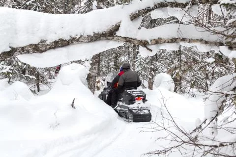 Athletes on a snowmobile Stock Photos