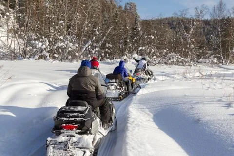 Athletes on a snowmobile Foto stock