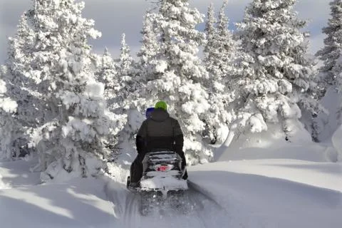 Athletes on a snowmobile Stock Photos