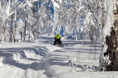 Athletes on a snowmobile Stock Photos