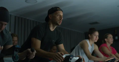 Athletes in a spinning class Stock Footage 97292905