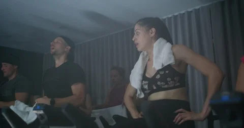 Athletes taking a break from a spinning class Stock Footage 97079410