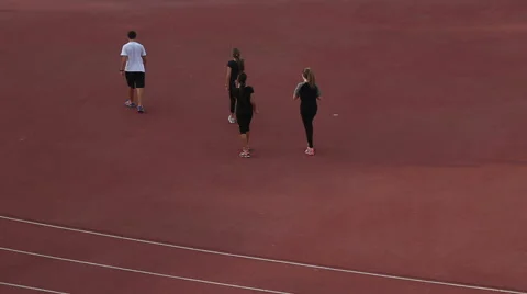 Athletes walking out of the track Stock Footage 42779372