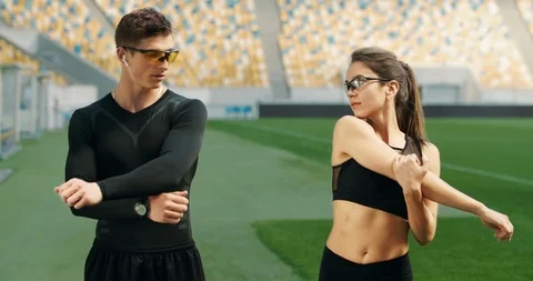 Athletes Warming up on Stadium Видео 112427371