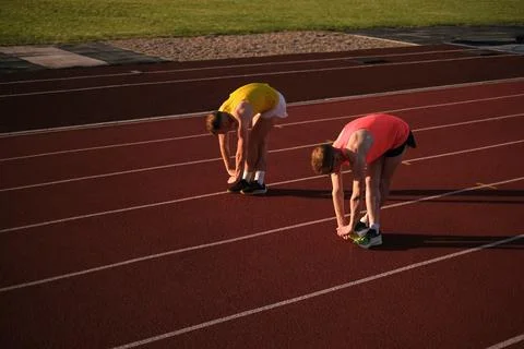 Athletes warming up at the stadium Foto stock