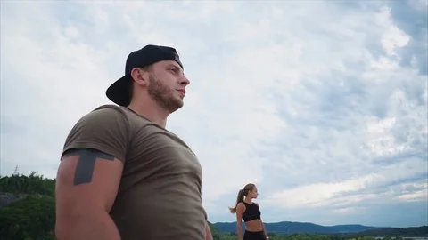 Athletes who have completed a joint training enjoy nature in the summer Stock Footage