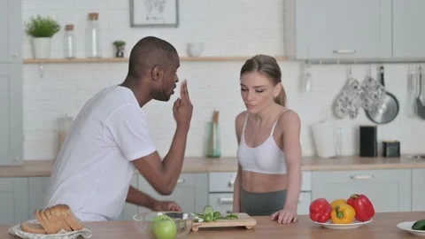 Athletic African Man Arguing with Young Woman in Kitchen Video stock 154719218