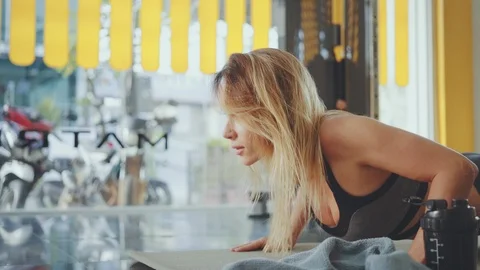 Athletic Beautiful Woman Does Push-ups as Part of Her Fitness in slow motion Stock Footage 106501338