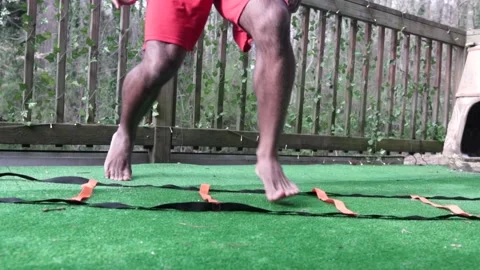Athletic Black Man Performs Shuffle Agility Drill, Turf, Closeup Slow Motion Stock Footage 161425094