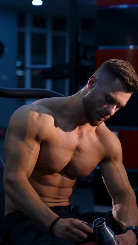 Athletic body. Shirtless model guy is posing to the camera.  Stock Footage 283037710