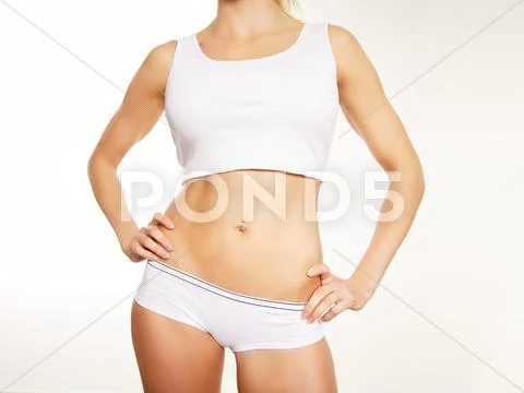 Athletic body of a woman isolated on white Stock Photos