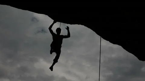 Athletic climber on overhanging route backlight Stock-Footage 43815121