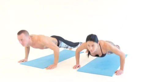 Athletic Couple Doing PushUps Stock Footage 60004009