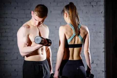 Athletic couple poses for the camera. Stock Photos