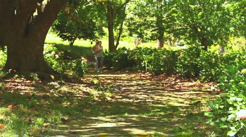 Athletic couple running in the wood Видео 2913705
