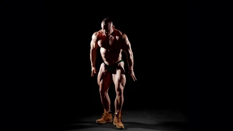 An athletic figure on a contrasting background is admirable  Video stock 300888410