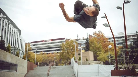 Athletic freerunners training outside. Parkour Stock Footage 86679360