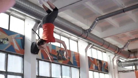 Athletic girl doing multiple backflips Stock Footage 75104695