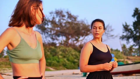 Athletic girls training on the beach Stock Footage 265840761