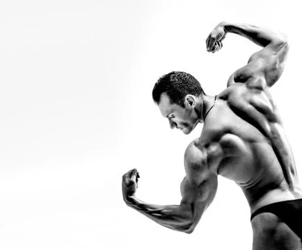 Athletic guy - bodybuilder,  pose on white background Foto stock