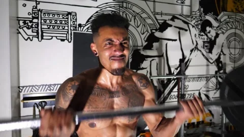 Athletic guy doing hard workout at sport club. Man training at fitness centre Video stock 307924342