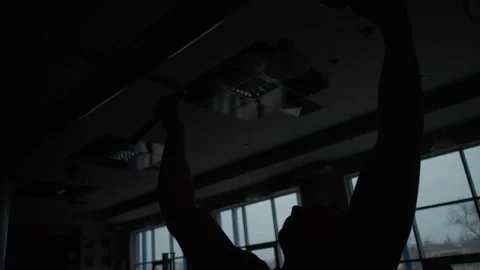 Athletic guy pulls himself up on horizontal bar. Stock Footage 154893955