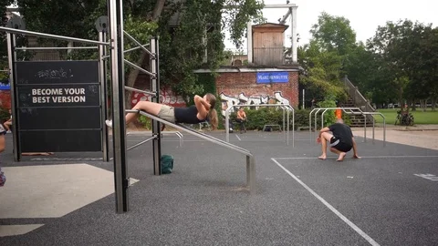 Athletic guys do workout in a city park in Berlin Video stock 114276555
