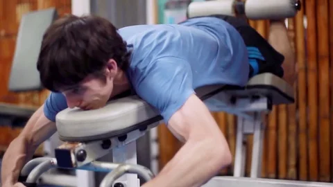 Athletic handsome man does exercises at gym. 1920x1080 Stock Footage 83175748