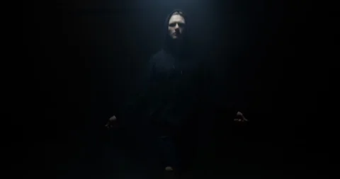 Athletic Male Training In Dark Background Skipping In Dark Black Hoodie Stock Footage 113848248