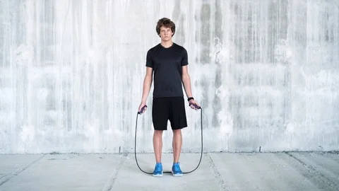 Athletic male working out in an empty industrial building Stock Footage 112655649