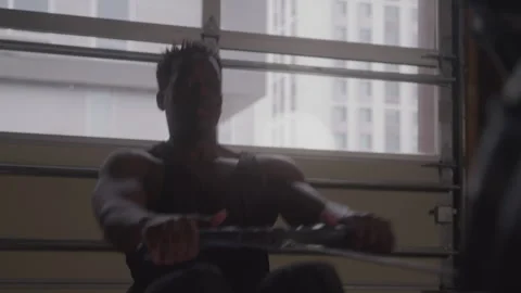 Athletic Man Does Row Machine Vídeo Stock 270324068