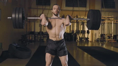 Athletic man doing barbell snatch Video stock 152830772